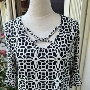 TACERA. NWT. Black & White Midi dress w/ Bell Sleeves.Crisscross straps …